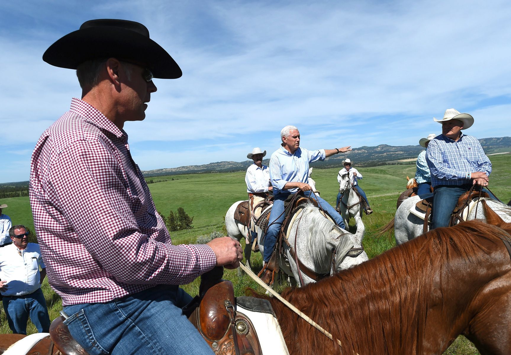 Pence and Zeinke on horseback